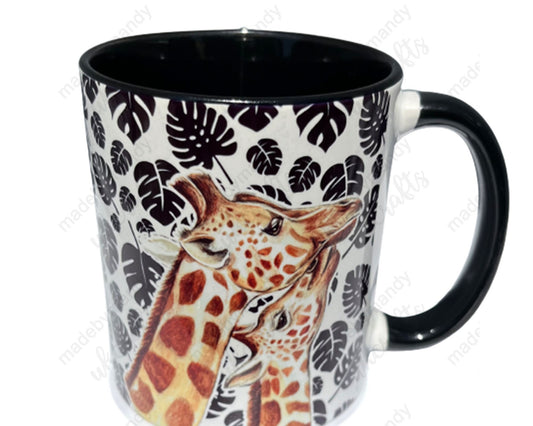 Giraffe and calf themed mug with black Monstera (cheese plant) leaf pattern - Beautiful gift for family, friends or colleagues