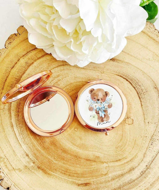 Personalised rose gold compact pocket mirror with a hand drawn bear holding a blue heart shaped bouquet of flowers Sister Mum aunt nan Gift